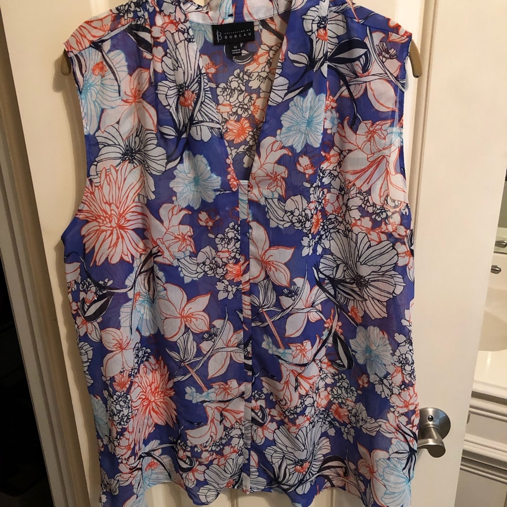 Blue floral sheer sleeveless top. 1x